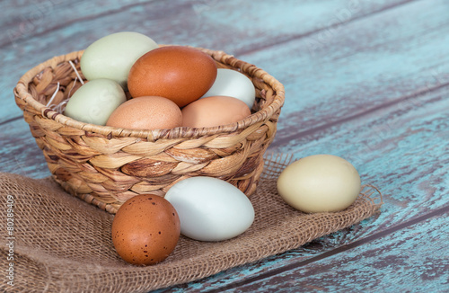 Fresh chicken eggs in a basket