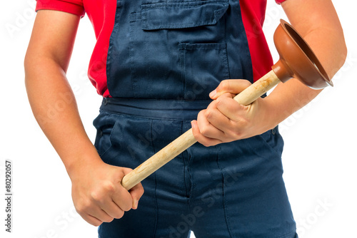plunger for pipe in the hands of a plumber