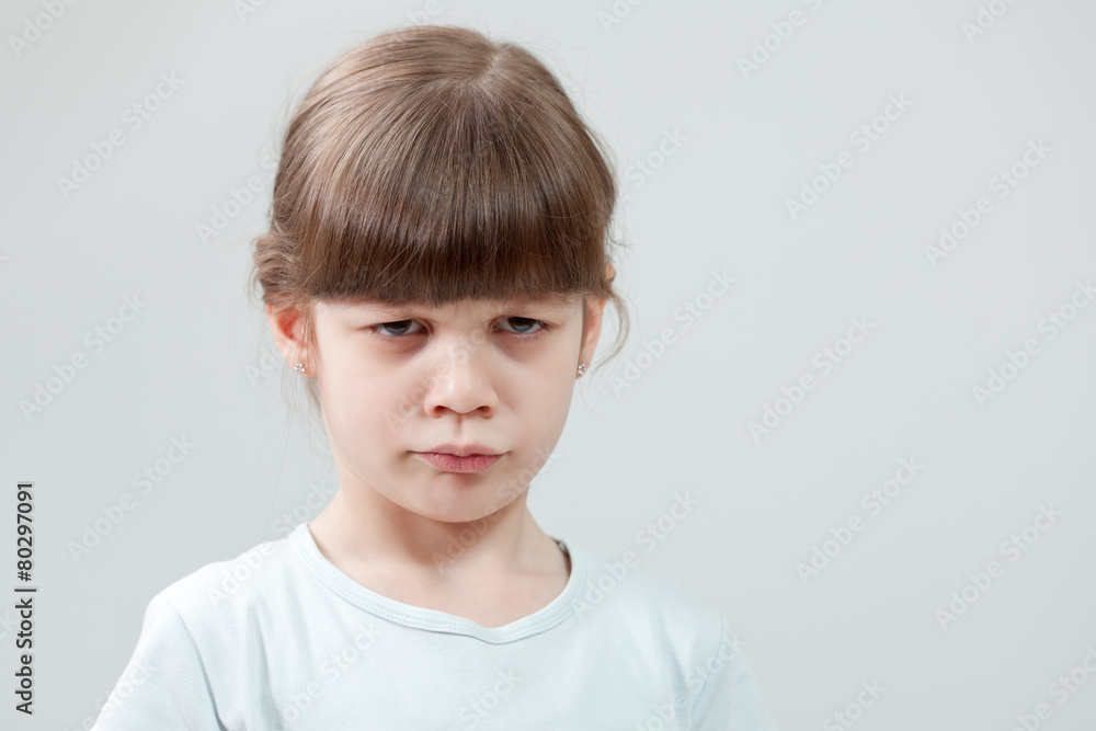 Portrait of displeased child Portrait of displeased child