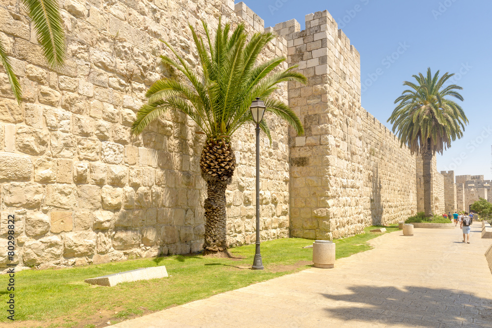 The ancient city walls and towers in the old Jerusalem The ancient city walls and towers in the old Jerusalem