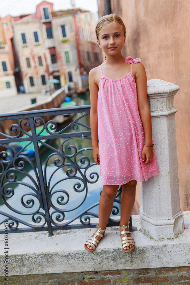 Portrait of fashion girl in Venice, Italy