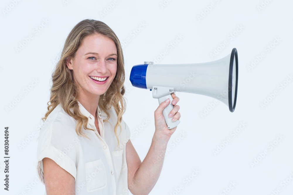 Woman speaking through a loudspeaker Woman speaking through a loudspeaker
