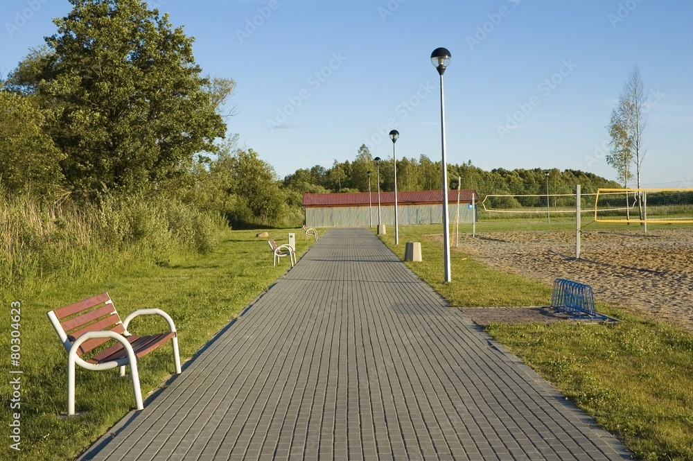Boardwalk with empty benches