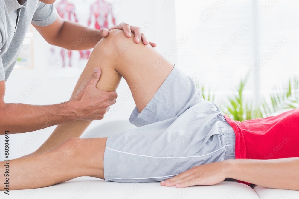Obraz premium Man having leg massage
