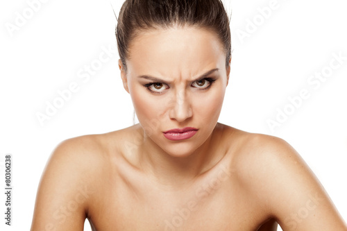 angry young woman looking at the camera