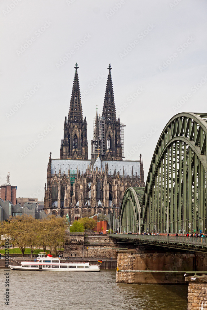 Cologne Cathedral and Hohenzollern Bridge over Rhine river