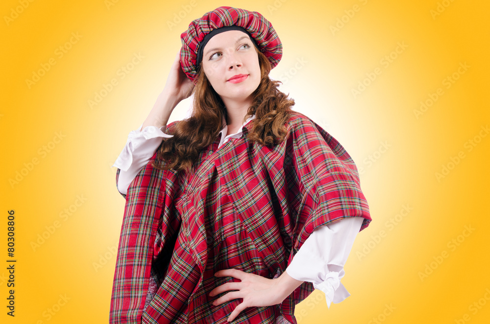 Young woman in traditional scottish clothing