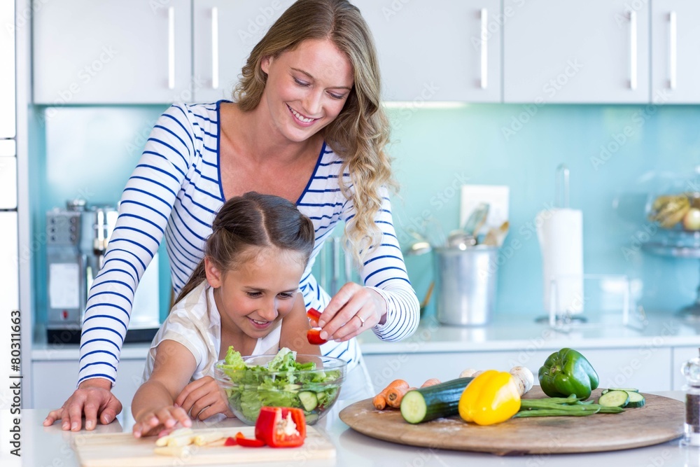 Happy family preparing lunch together Happy family preparing lunch together