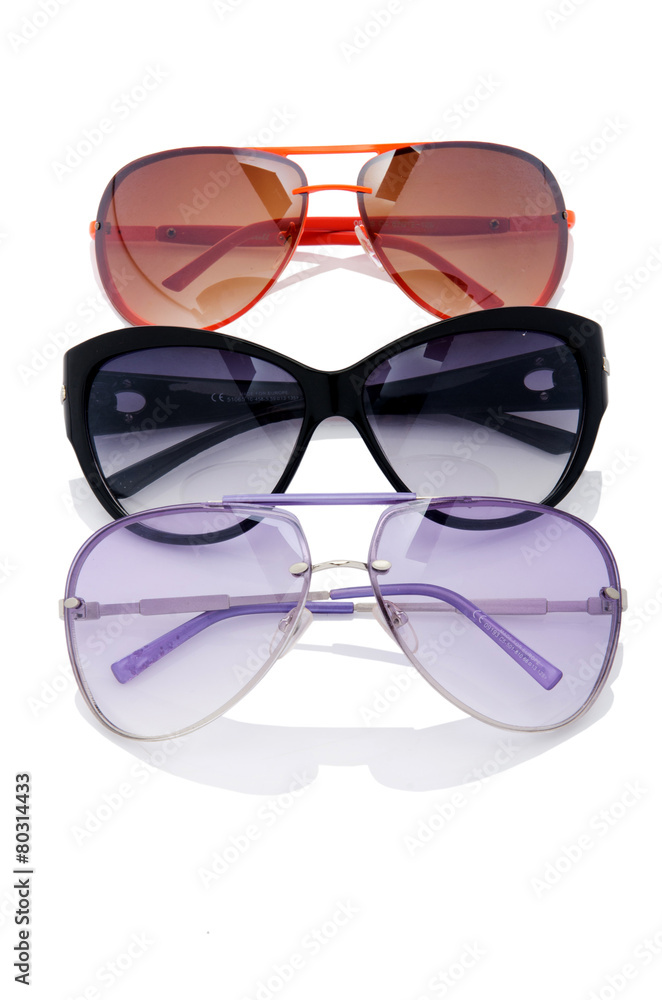 Elegant sunglasses isolated on the white Elegant sunglasses isolated on the white