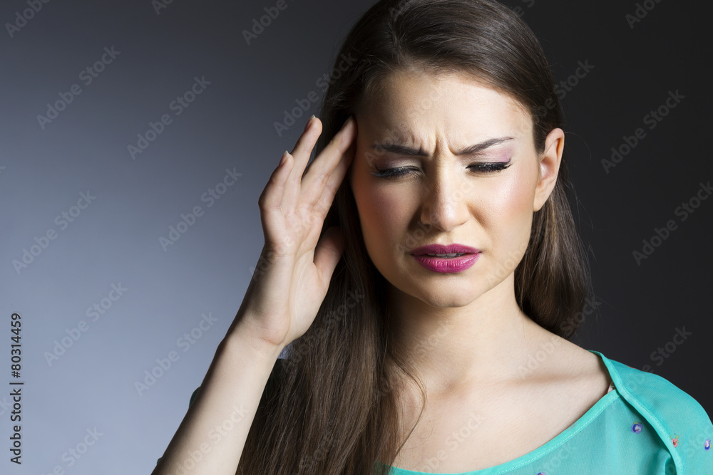 Fototapeta premium Woman suffering from headache