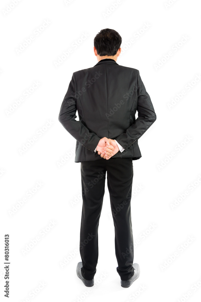 Businessman standing with back isolate
