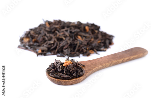 Jasmine Green Tea in wood spoon on white background photo