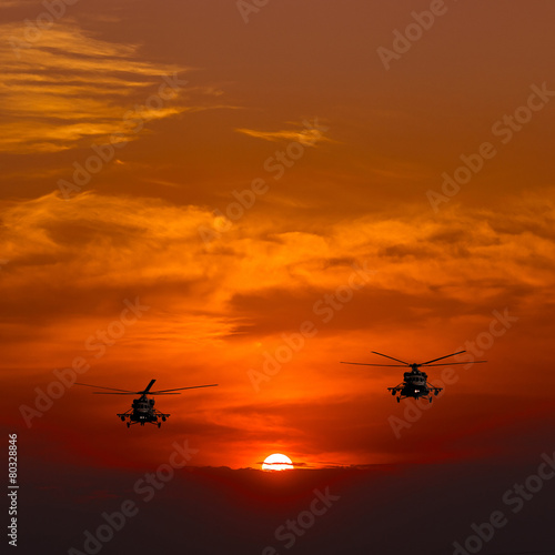 Mi-8 helicopters, warm sunset © Baranov