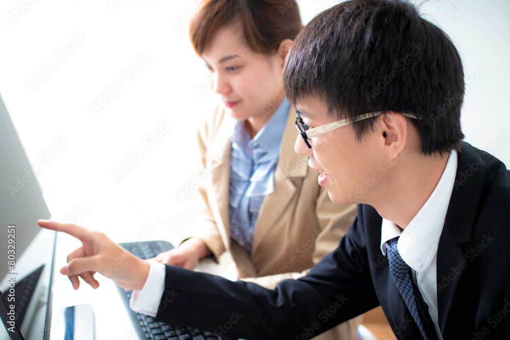 Business people discussing the charts and graphs showing the res Business people discussing the charts and graphs showing the res