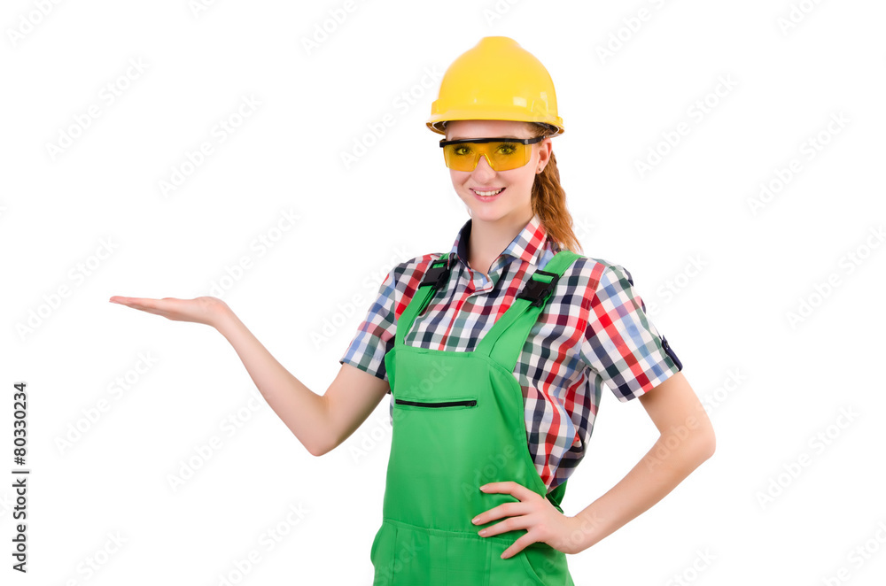 Female handyman in overalls isolated on white Female handyman in overalls isolated on white