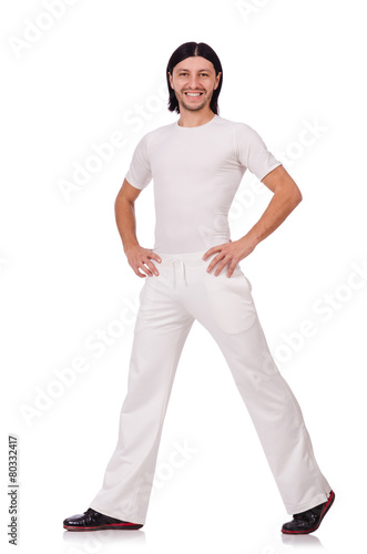 A man in white sportswear isolated on white © Elnur