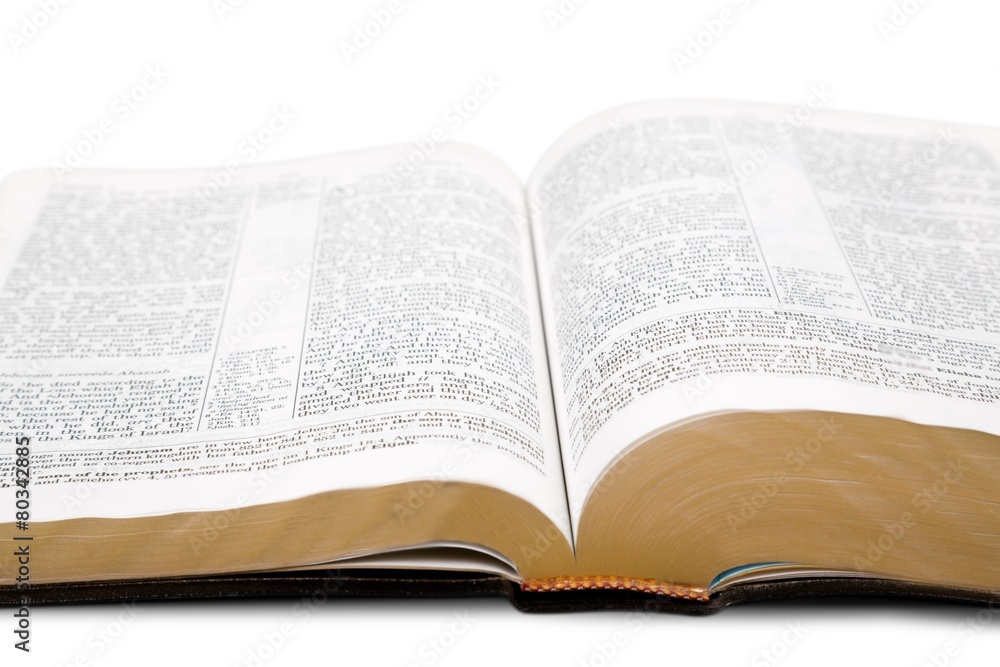 Open. Detail of an old holy bible open with a beautiful and Open. Detail of an old holy bible open with a beautiful and