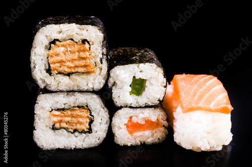 sushi over black background