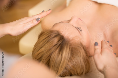 Relaxing during reiki healing photo