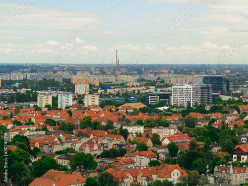 aerial view from tower of district gdansk buildings and sea.