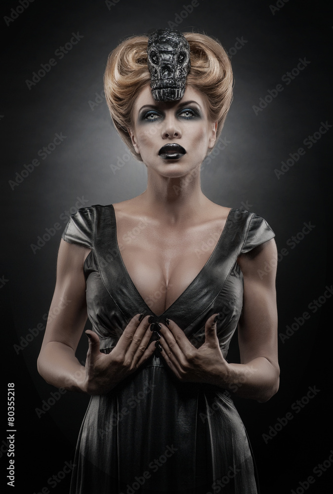 Gothic blond vampiric woman