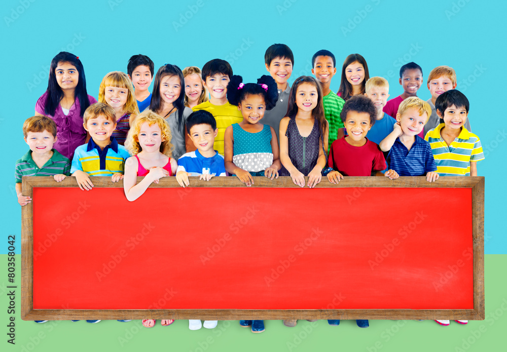 Multi-Ethnic Group of Children Holding Billboard Concept Multi-Ethnic Group of Children Holding Billboard Concept