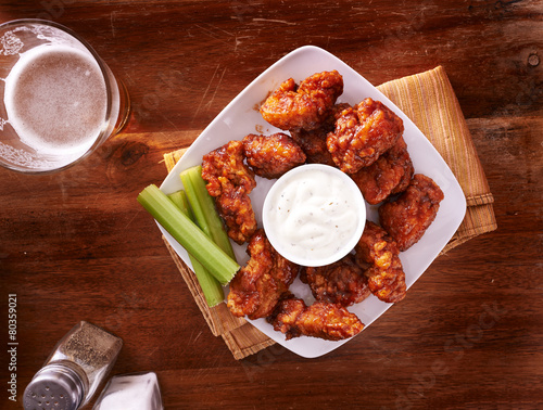 bbq buffalo chicken wings with beer ranch and celery