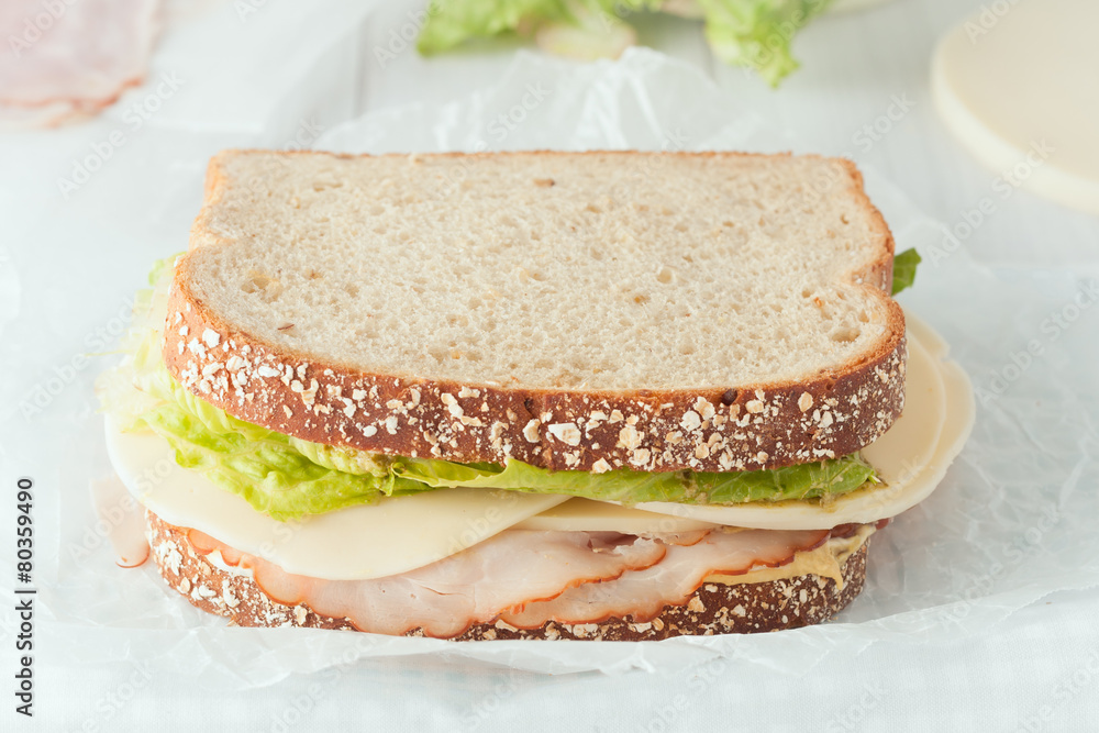 sandwich with ham, cheese and lettuce sandwich with ham, cheese and lettuce