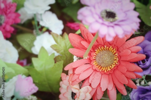 Beautiful vintage gerbera of artificial flowers