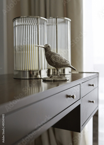 bird sculpture in bedroom as interior decoration
