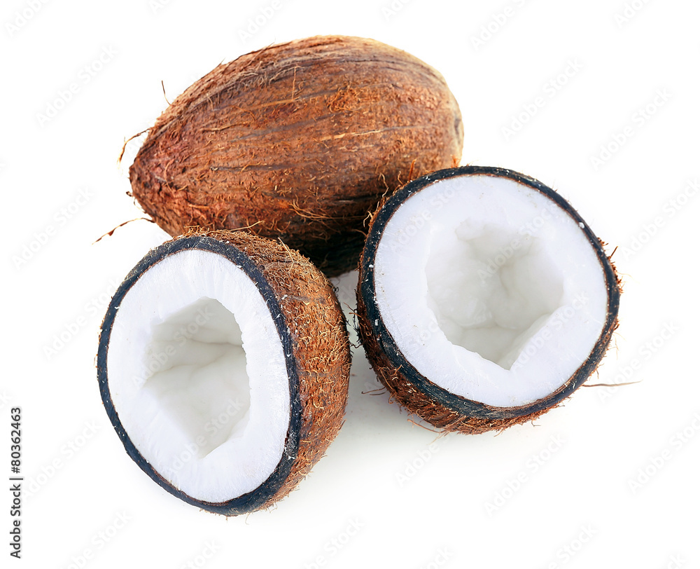 Coconut cut in half isolated on white background Coconut cut in half isolated on white background