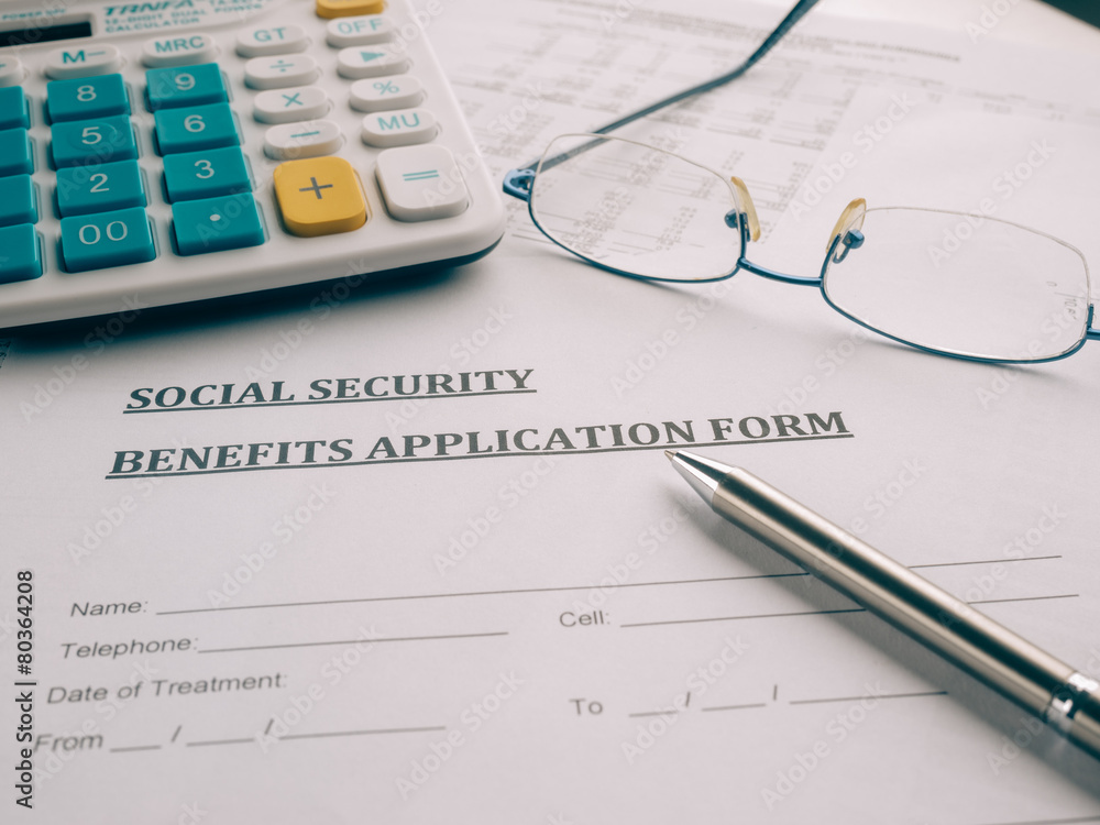 social security benefits application form on the desk.