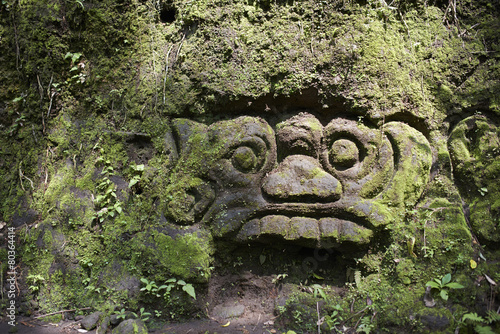 stone face in rock and earth as holy symbol