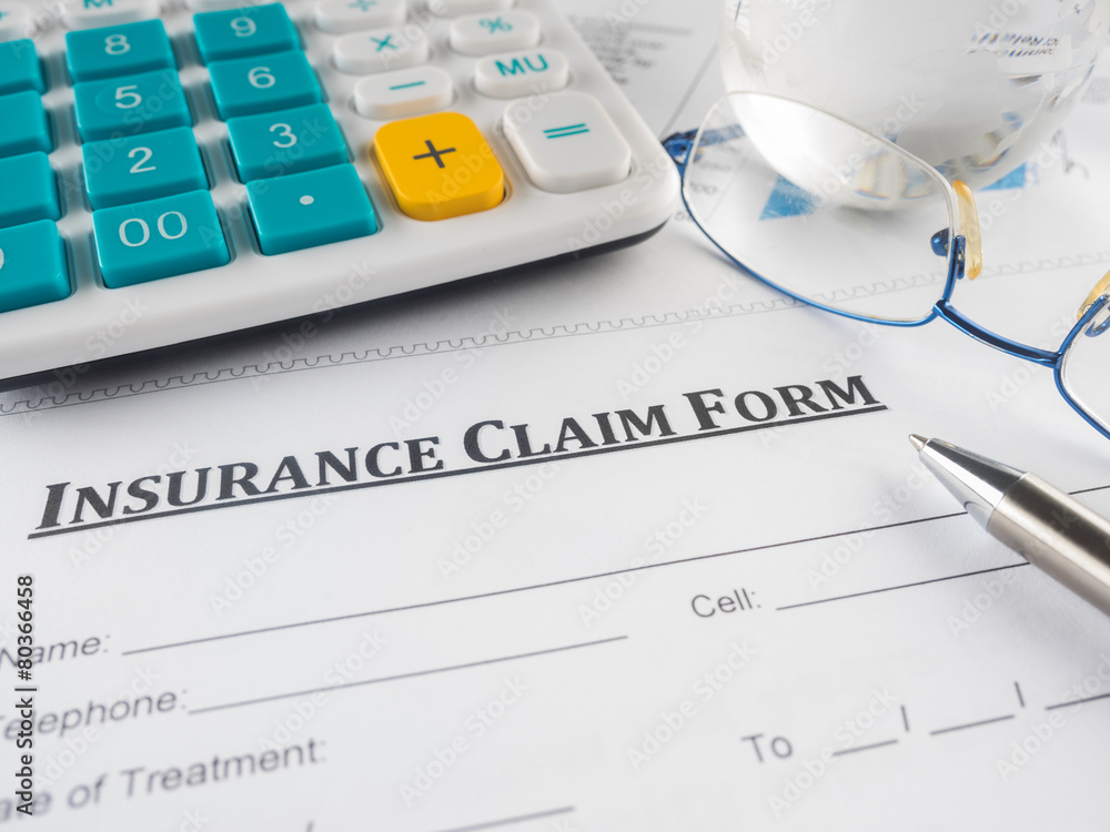 insurance claim form on the desk. insurance claim form on the desk.