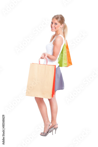 Woman with shopping bags, isolated on white