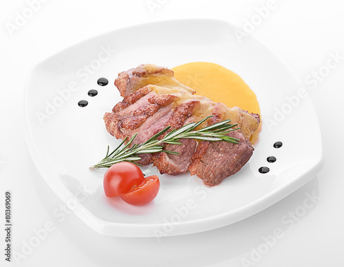 Beef steak medium grilled, isolated on white background