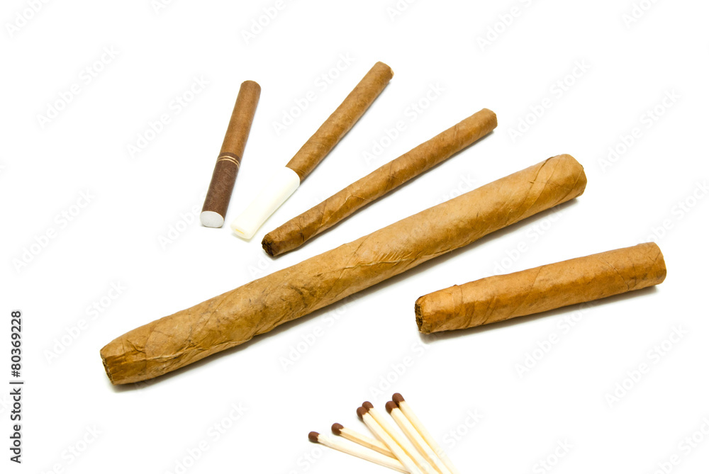 different cigars and cigarillos with matches