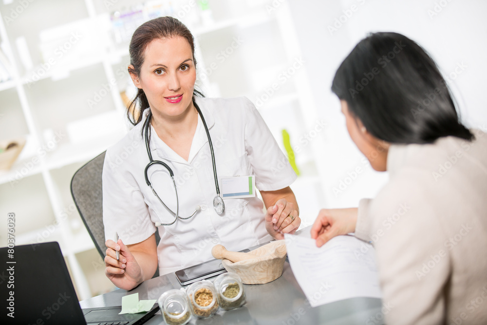 Homeopathy.Young woman in an office at the doctor homeopaths. Homeopathy.Young woman in an office at the doctor homeopaths.