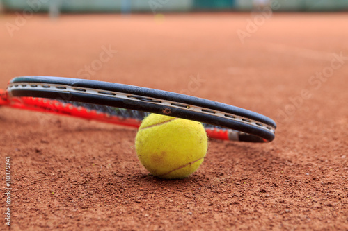 Tennis ball and racket © rolandbarat