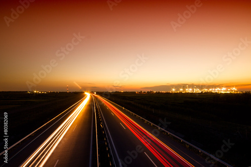 Cars speeding on a highway