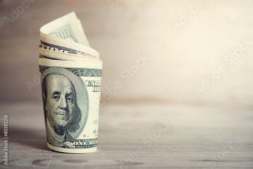 Hundred dollar bills rolled