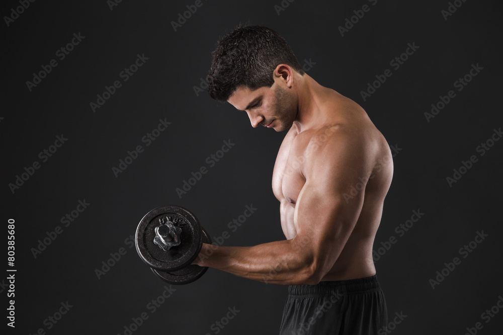 Muscular man lifting weights Muscular man lifting weights