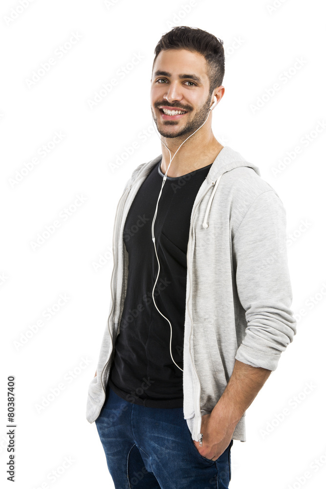 Fototapeta premium Man smiling and listen music