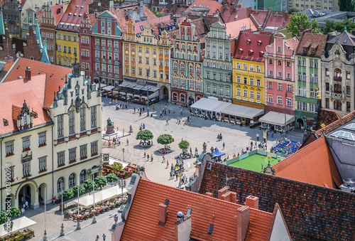 People walking on the market square in Wroclaw, Poland. photo