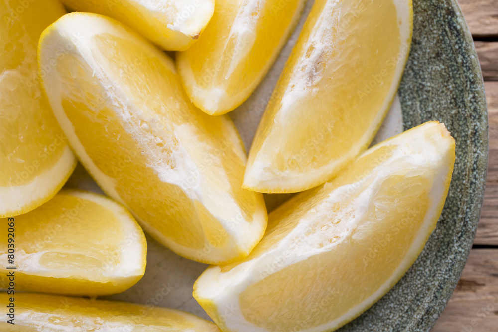 Yellow grapefruit slice on a plate. Yellow grapefruit slice on a plate.