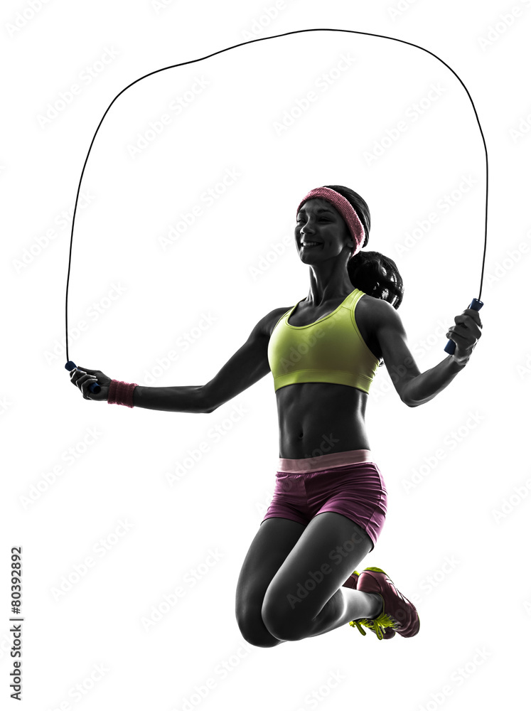 woman exercising fitness jumping rope silhouette woman exercising fitness jumping rope silhouette
