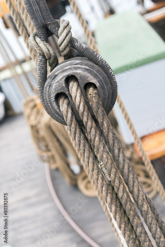 Wooden sailboat pulleys and ropes detail