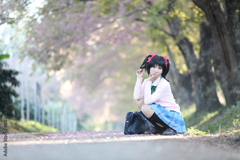 Naklejka premium asian schoolgirl with nature