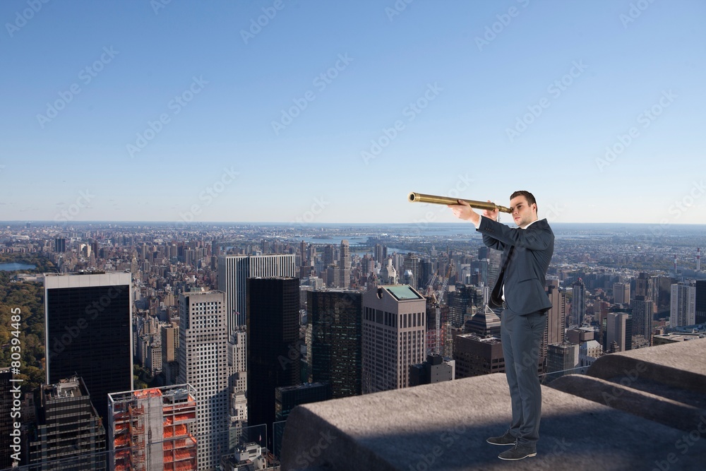 Composite image of businessman looking through telescope Composite image of businessman looking through telescope