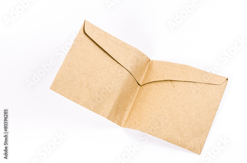 folded brown envelope on white background
